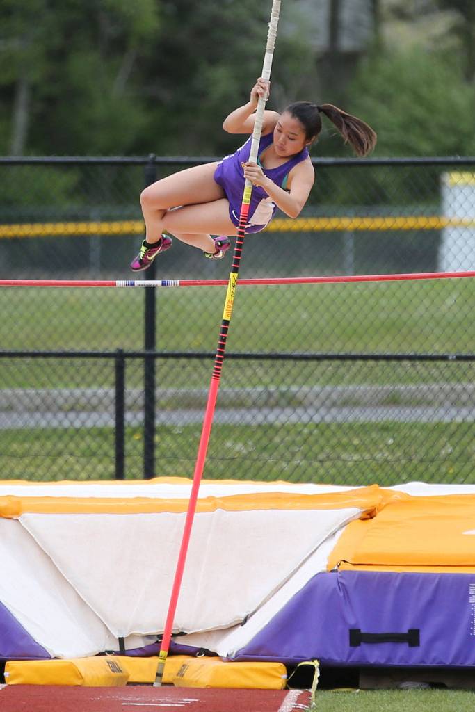 Naomi Garcia attempts to clear the bar in the pole vault Tuesday. (Photo by John Fisken)