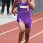 Zion Gomez competes for Oak Harbor in the 100 meters. (Photo by John Fisken)
