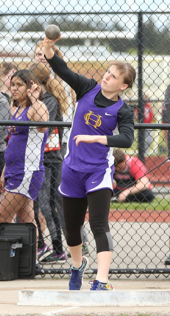 Halle Lemme tosses the shot put in the North Sound Classic Tuesday. She finished third in the freshman division and added a third in the javelin. (Photo by John Fisken)