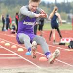 Long jumper Andrew Miller picks up one of five wins by Oak Harbor Saturday. (Photo by John Fisken)