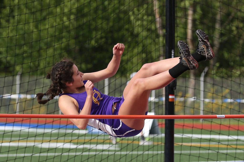 Kristina Tirado competes in the district high jump at Shoreline. (Photo by John Fisken)