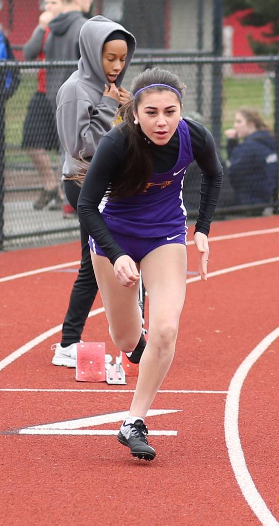 Jennifer Turnek shoots out of the blocks in 400 meters. (Photo by John Fisken)