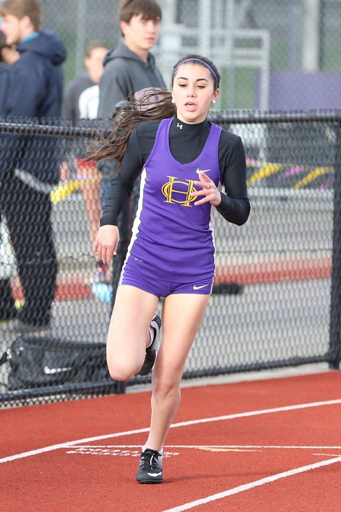 Jennifer Turnek runs in the 400-meter finals at the Wesco North meet. (Photo by John Fisken)