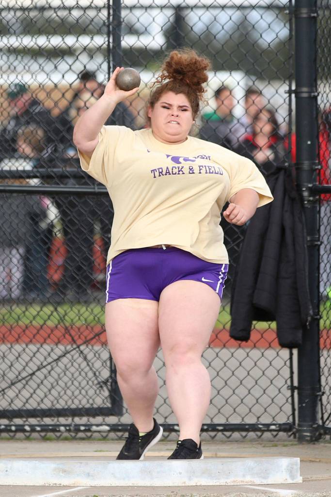 Sarah Ulam puts the shot for a ninth-place finish Friday. (Photo by John Fisken)