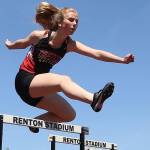 School records fall as Wolves send 10 to state / Track