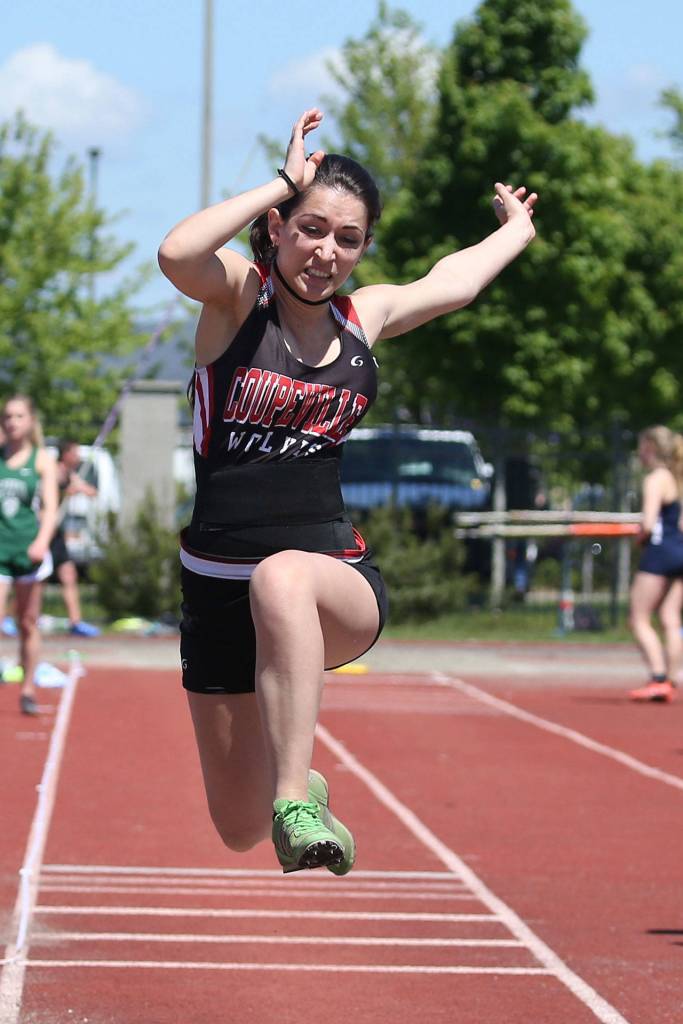 Aurora Zanardi places sixth in the triple jump for the Wolves. (Photo by John Fisken)