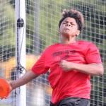 Kanye Kitchens tosses the discus for Wildcat United. He finished second in the event and won the shot put. (Photo by John Fisken)