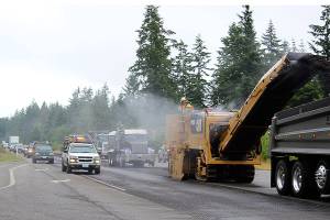 Road crews will be out all summer repaving more than 30 miles of Highway 525/State 20 from Coupeville to Clinton. Drivers should allow an extra 30 minutes for their trips and to catch ferries. Crews worked near the intersection of Classic Road and HIghway 525 Tuesday morning putting down new asphalt and rolling it out. Whidbey&rsquo;s main corridor work is long overdue, officials say.