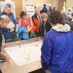 Residents look over maps for possible additions to hiking, biking and beach areas on Whidbey Island during public meetings this winter. A second round of meetings take place in June on the non-motorized trail plan. Photo by Patricia Guthrie/Whidbey News-Times