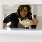 Robyn Myers, conference services manager at the Camp Casey Conference Center and Fort Casey Inn, has some fun while providing a tour of the iconic Colonel&rsquo;s House Wednesday, June 7, 2017. The house and other attractions at the former Fort Casey will be open for the public to view during an open house from noon-4 p.m. Friday, June 16. Photo by Ron Newberry/Whidbey News-Times