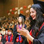 Robin Cedillo, right, gets ready to step up and receive her diploma during the commencement ceremony for Coupeville High School&rsquo;s Class of 2017 Friday night, June 9, 2017. Emily Rose is in the background. Photo by Ron Newberry/Whidbey News-Times