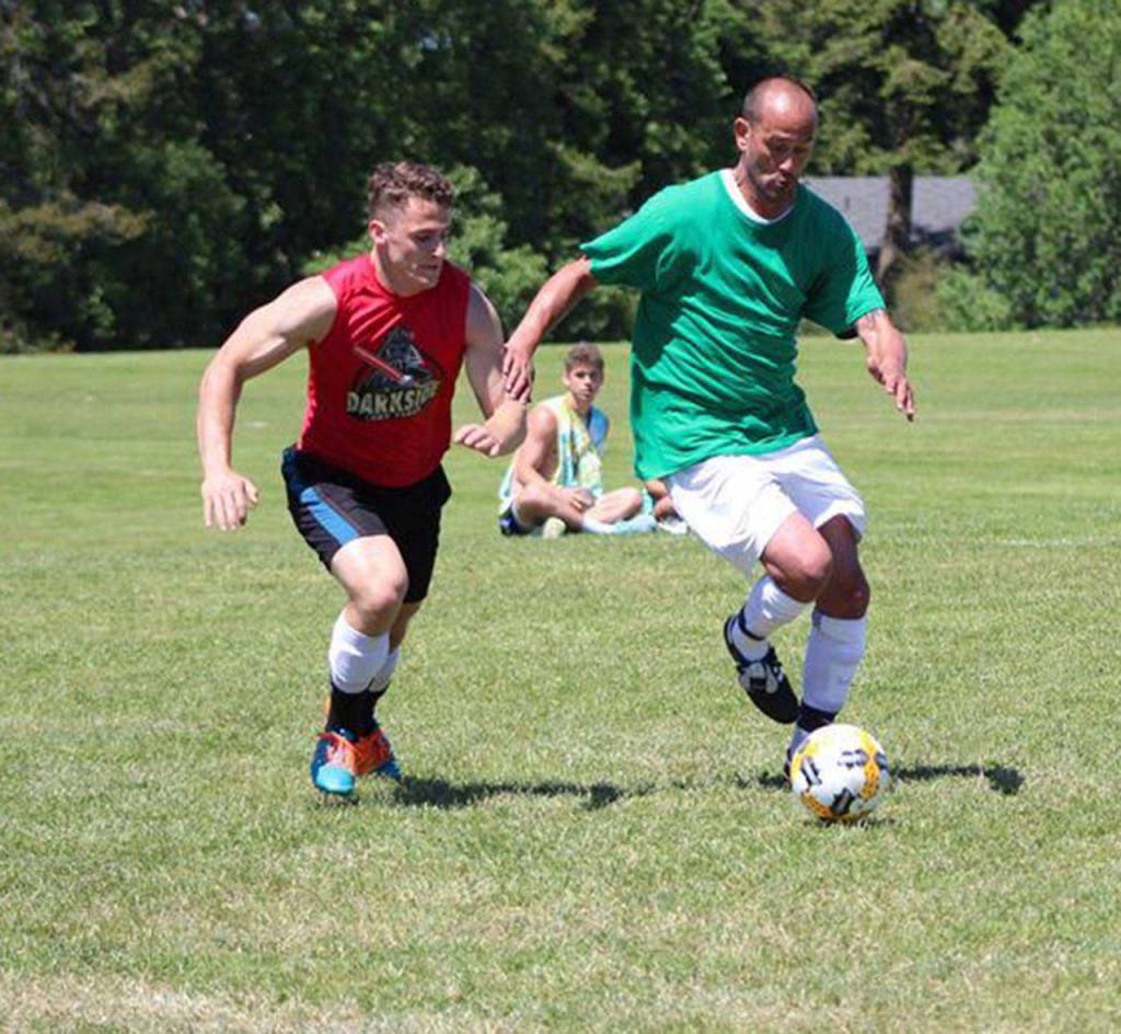 Yancy, left, and Mays race to gain control. (Photo by Trina Coe)