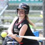 Kylie Vanvelkinburg attacks a pitch in the sweep of Orcas Island Saturday. (Photo by John Fisken)