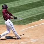 Anthony Stewart rips a hit for Minnesota Crookston. (Photo by Shawn Smith)