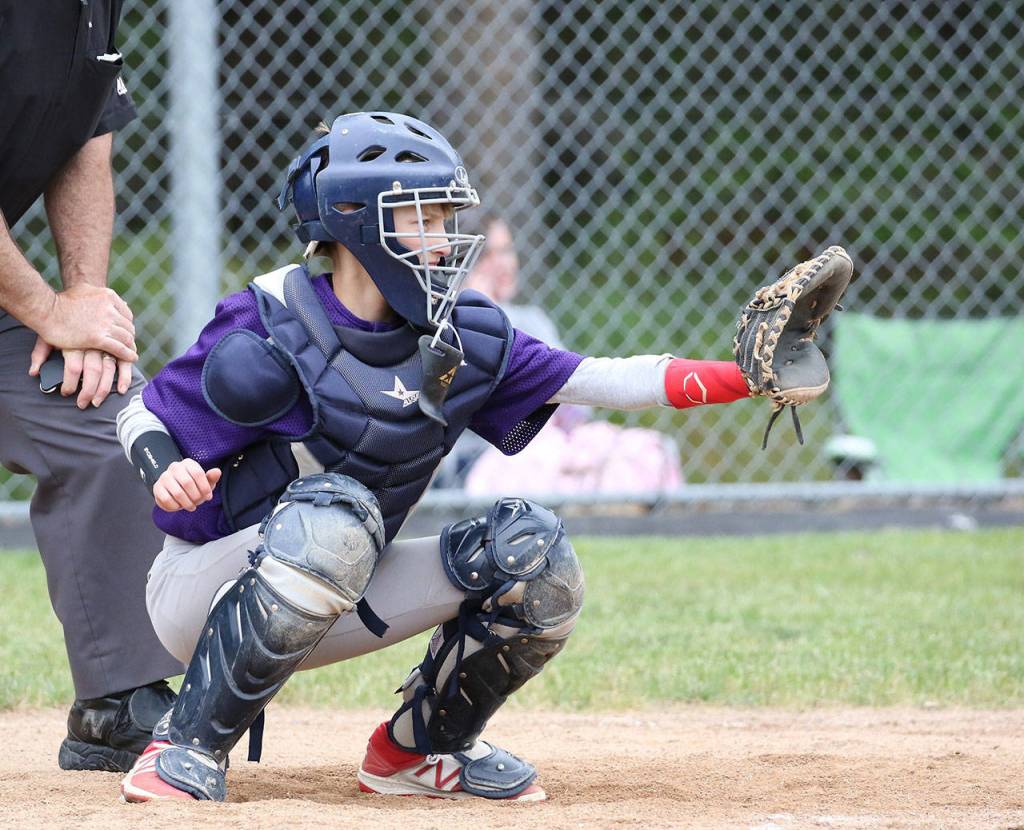Catcher Brock Boyer waits for a pitch. (Photo by John Fisken)