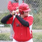John Carlson focuses on the next pitch. (Photo by Jim Waller/Whidbey News-Times)