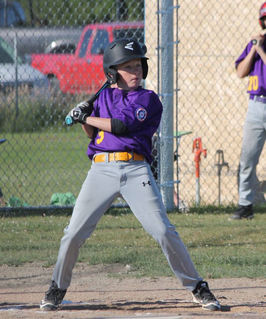 Cody Duchnowski leans out of the way of a high and inside pitch. (Photo by Jim Waller/Whidbey News-Times)