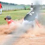 Gavin Knoblich scores Coupeville&rsquo;s first run on a wild pitch. (Photo by Karen Carlson)