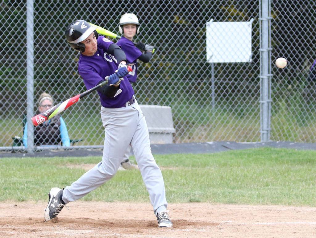 Gage McLeod takes a rip at a pitch. (Photo by John Fisken)