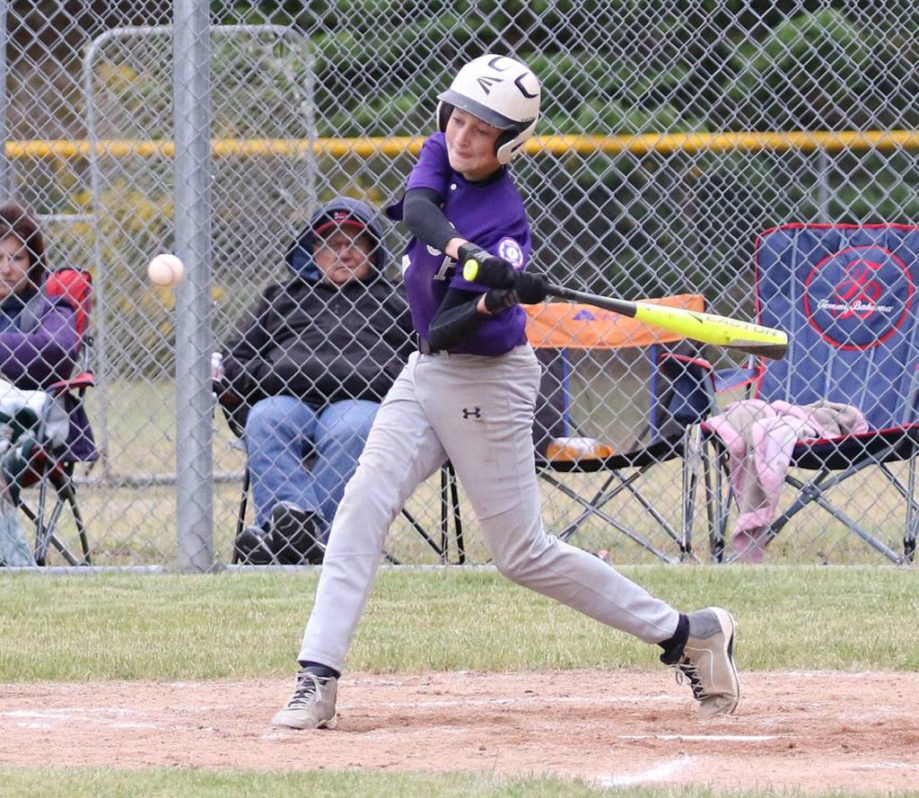 Will Rankin swings at a pitch in Saturday&rsquo;s game. (Photo by John Fisken)