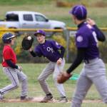 First baseman Will Rankin catches a pickoff throw from pitcher Kyto Morrow. (Photo by John Fisken)