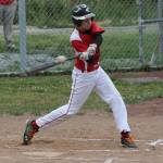 Cody Roberts makes contact with a pitch. (Photo by Jim Waller/Whidbey News-Times)