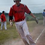 Cody Roberts scores for Coupeville on Chelsea Prescott&rsquo;s hit. (Photo by Karen Carlson)