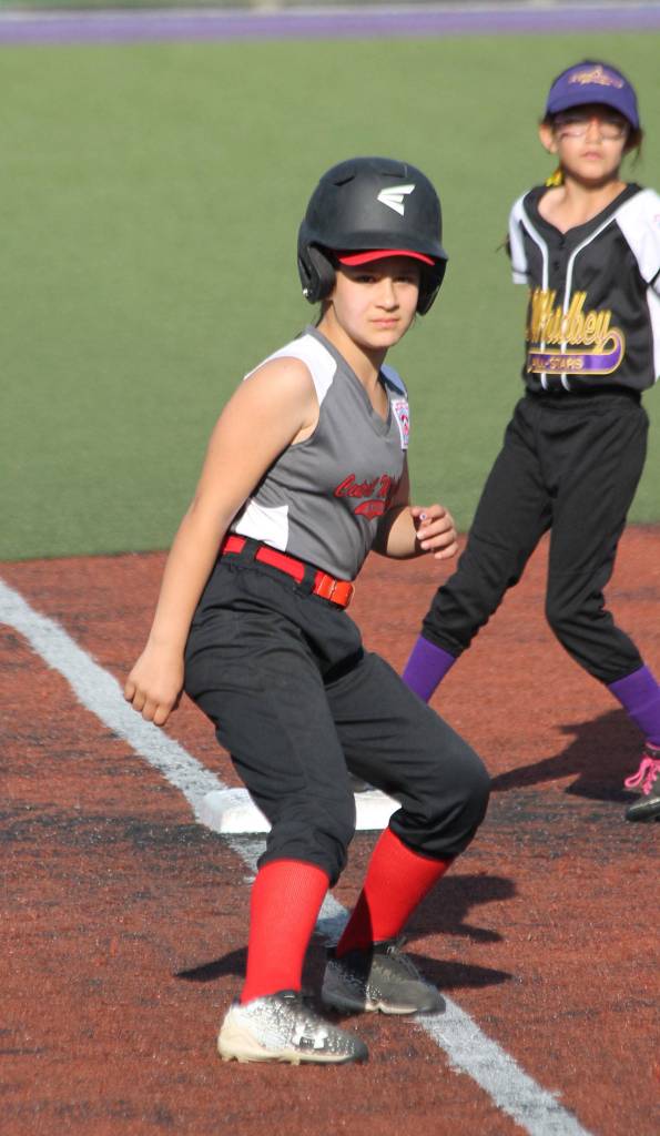 Chloe Marzocca gets a good lead at third base for Central Whidbey. (Photo by Jim Waller/Whidbey News-Times)