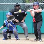 Mollie Bailey smacks a hit for Central Whidbey. (Photo by John Fisken)