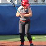 Central Whidbey&rsquo;s Madison McMillan gets plunked on the leg by a pitch. (Photo by Jim Waller/Whidbey News-Times)