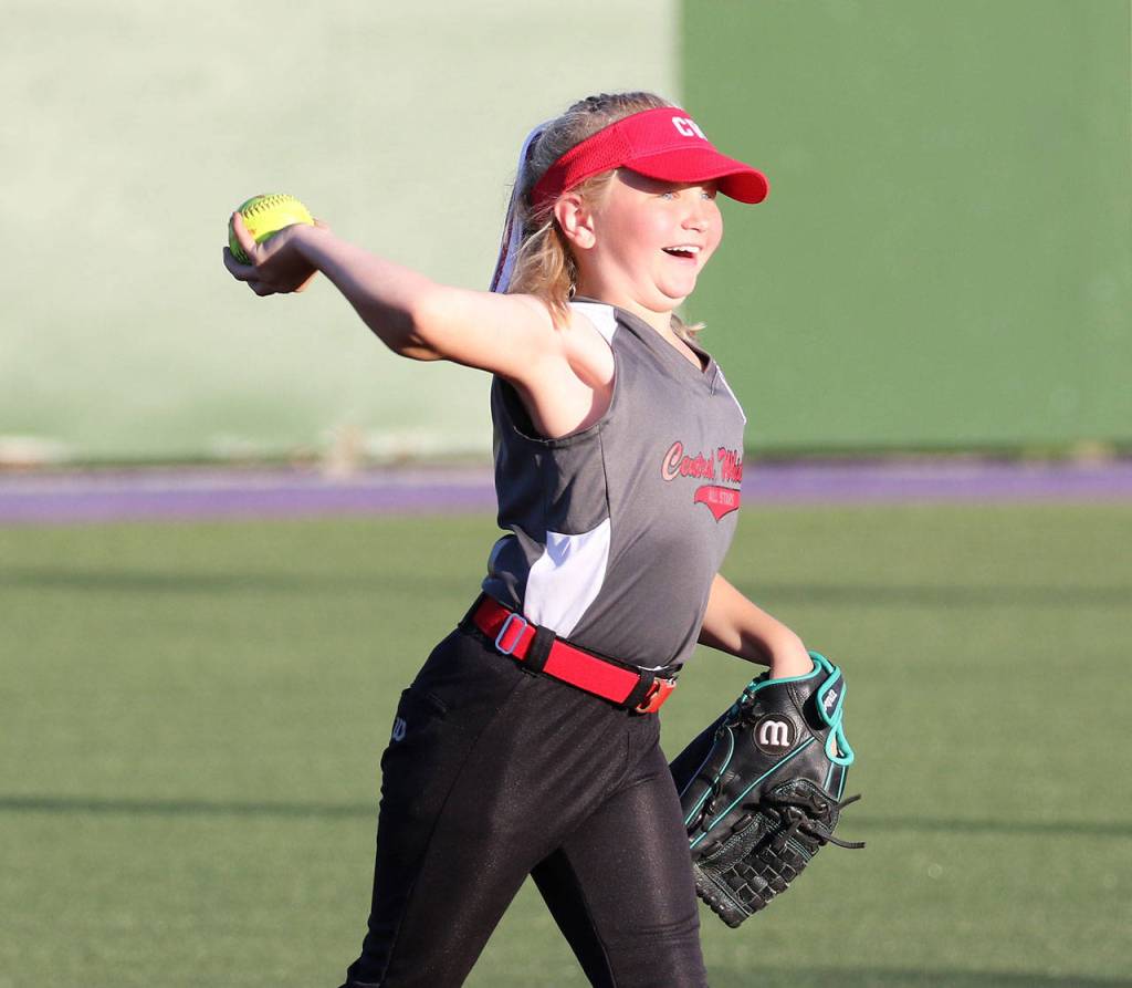 Softball and sunshine: Taylor Brotemarkle has a lot to smile about in the district tournament. (Photo by John Fisken)