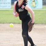 Central Whidbey pitcher Melody Wilkie burns in a strike Saturday. Wilkie finished with 14 strikeouts in the first game. (Photo by John Fisken)