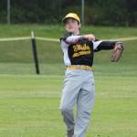 Gold second baseman Dylan Dearing flips the ball to first base. (Photo by Jim Waller/Whidbey News-Times)