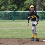 Shortstop Saniel Santiago holds a Bonney Lake-Sumner runner at second base. (Photo by Jim Waller/Whidbey News-Times)