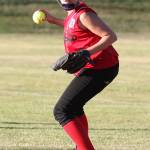 Central Whidbey&rsquo;s Abby Mulholland prepares to throw after recording a force-out at first base. (Photo by John Fisken)