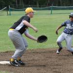 Gold third baseman Justin Vasileff awaits a throw as a Bonney Lake-Sumner runner advances. (Photo by Jim Waller/Whidbey News-Times)