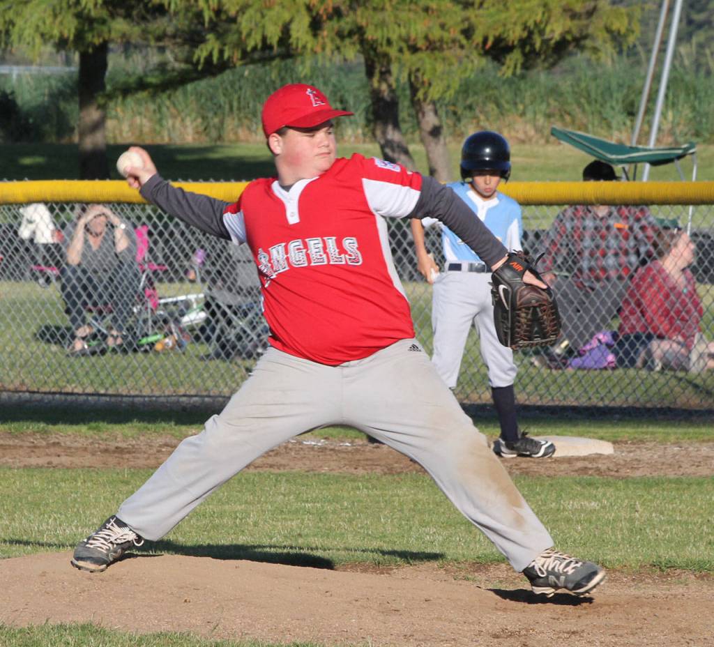 Brady Towsley takes over on the mound for the Angels. Towsley later hit a home run in Friday&rsquo;s game. (Photo by Jim Waller/Whidbey News-Times)