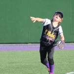 Ava Shoosmith fires a throw in from the outfield as North Whidbey guns down a runner at the plate. (Photo by Jim Waller/Whidbey News-Times)
