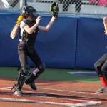 Caidence Meadors prepares to tag a Central Whidbey runner trying to score. (Photo by Jim Waller/Whidbey News-Times)