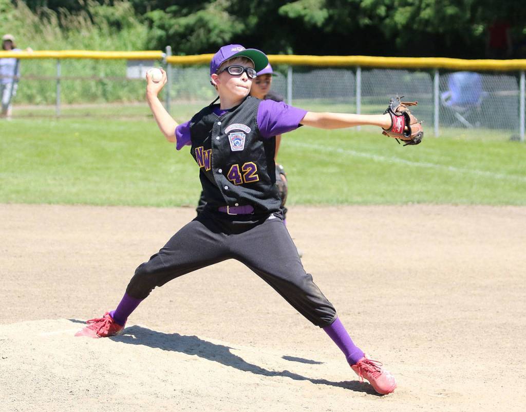 Jackson Wesley mows down Anacortes in the final inning to preserve the North Whidbey win. (Photo by John Fisken)