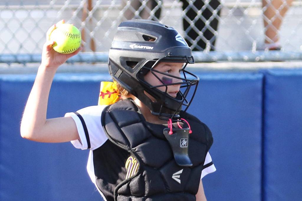North Whidbey catcher Caidence Meadors looks back a runner. (Photo by John Fisken)