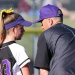 Pitcher Reese Wasinger receives some encouraging words from her coach and father, Brian Wasinger. (Photo by John Fisken)