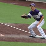 Oak Harbor Andrew Dixon waits for a pickoff throw Saturday. (Photo by Jim Waller/Whidbey News-Times)