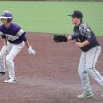 Taylor Rummel leads off first base in the Anacortes game Saturday. (Photo by Jim Waller/Whidbey News-Times)