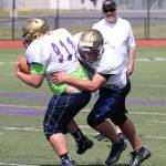 Wildcats, Wolves hit field for spring camp / Football