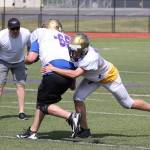 Wildcats, Wolves hit field for spring camp / Football