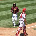 Anthony Stewart scores a run for Crookston this past season. (Photo by Shawn Smith)