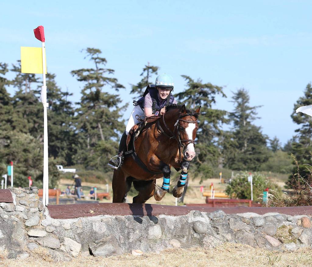 Oak Harbor&rsquo;s Madison Petersen and Christian Bay take part in the Whidbey Island Horse Trials this weekend. (Photo by John Fisken)