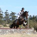 Greta Seyfried, riding I&rsquo;m Your Huckleberry, participates in cross country jumping Saturday. Seyfried attended Oak Harbor High School this past year as an exchange student. (Photo by John Fisken)