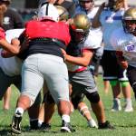Michael Fisken and Nathaniel Nunez double-team a Sunnyside defender.